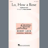 Download or print Lo, How A Rose (arr. Nancy Grundahl) Sheet Music Printable PDF 10-page score for Christmas / arranged SSA Choir SKU: 407588.