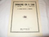 Download or print Swinging On A Star Sheet Music Printable PDF 4-page score for Easy Listening / arranged Piano, Vocal & Guitar (Right-Hand Melody) SKU: 40375.